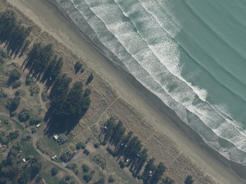 aerial view of Okains Bay and the ground around it