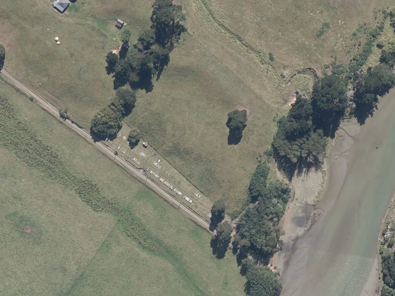 aerial view of Le Bons Bay Cemetery and the ground around it