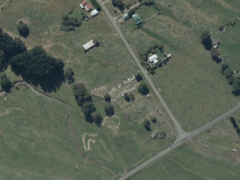 aerial view of Okains Bay Cemetery and the ground around it