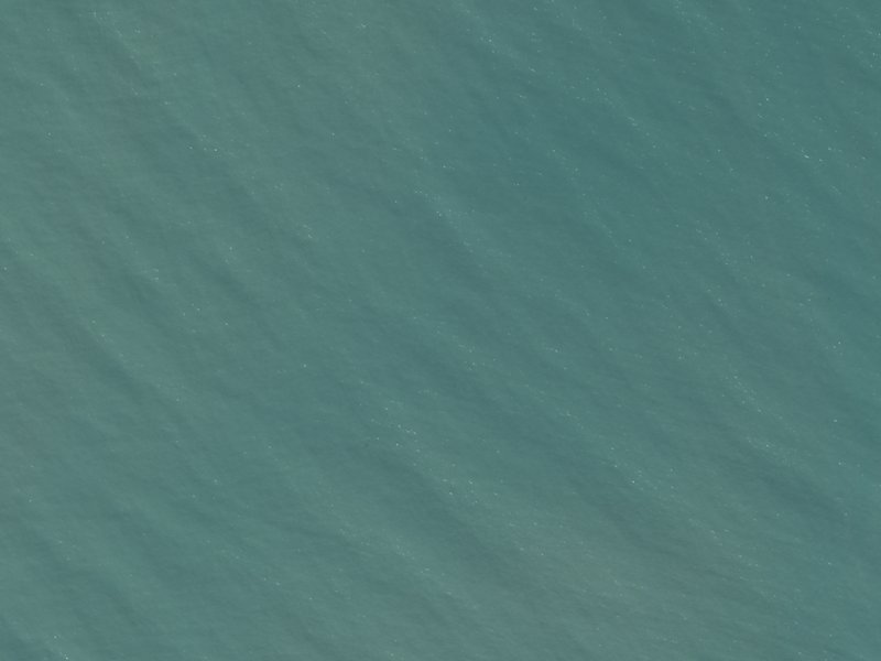 aerial view of Kawatea / Okains Bay and the ground around it