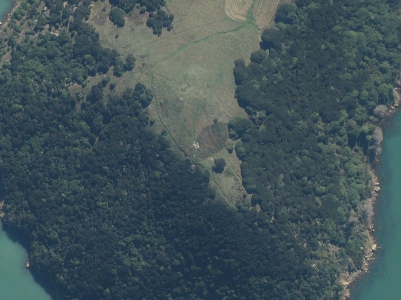 aerial view of Ōnawe and the ground around it