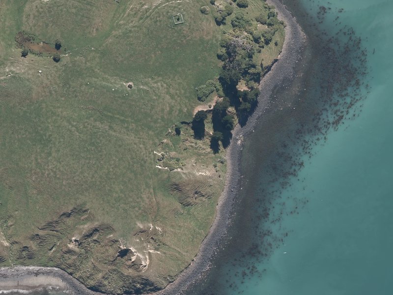 aerial view of Ōpukutahi and the ground around it