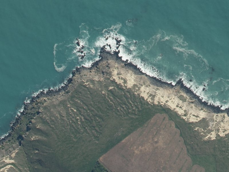 aerial view of Otohuao Head and the ground around it