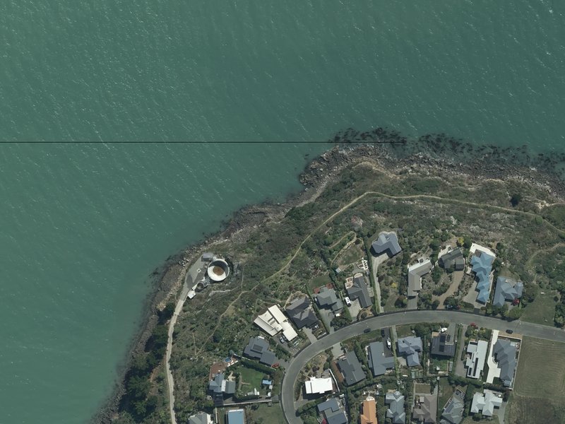 aerial view of Pauaohinekotau Head and the ground around it