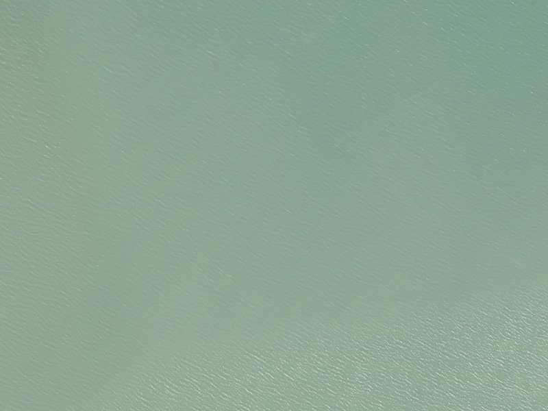 aerial view of Te Wharau / Charteris Bay and the ground around it