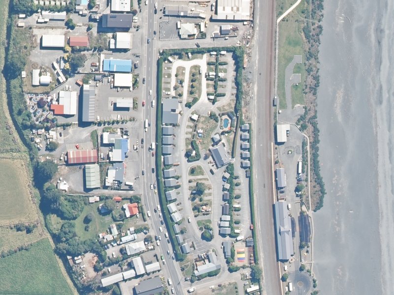 aerial view of Kaikoura Top 10 Holiday Park and the ground around it