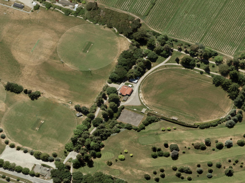 aerial view of Pleasant Point Domain Motor Camp and the ground around it