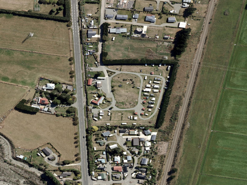 aerial view of Glenavys Waitaki River Motor Camp and the ground around it
