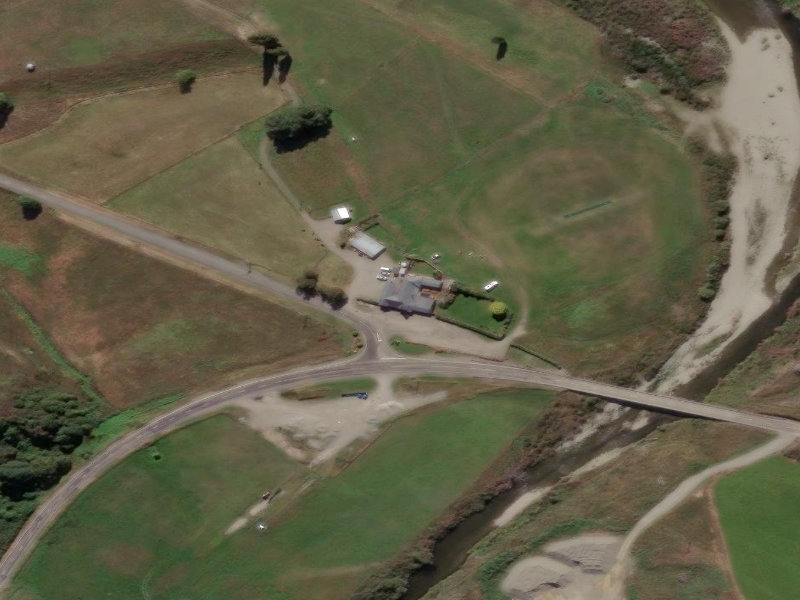 aerial view of Forks Hotel and the ground around it