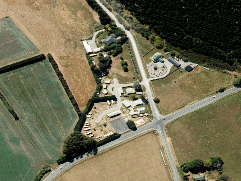aerial view of Grumpy's Retreat And Holiday Park and the ground around it