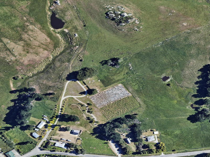 aerial view of Macraes Old Cemetery and the ground around it