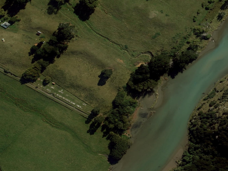 aerial view of Le Bons Bay Cemetery and the ground around it