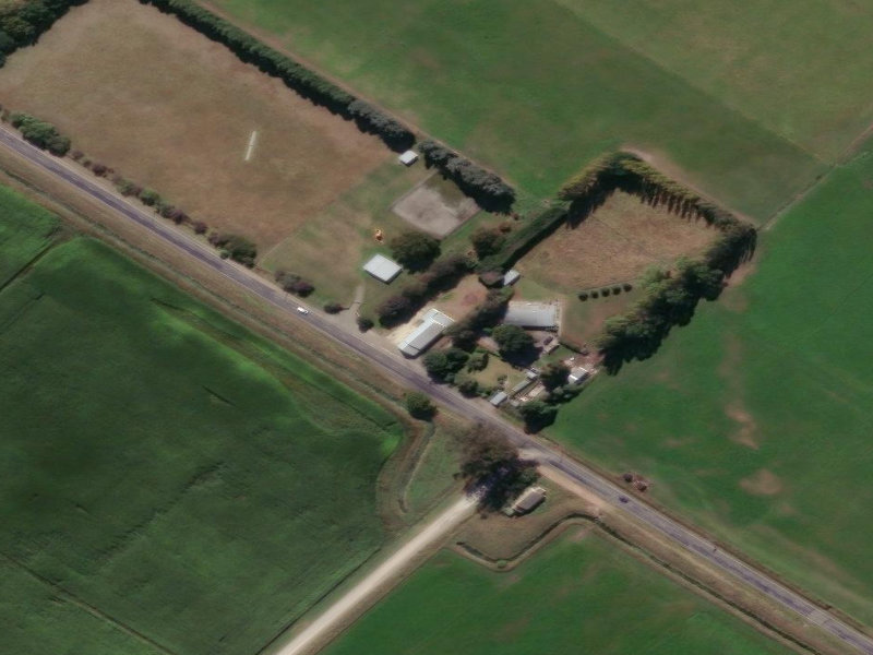 aerial view of Awamoko Hall and the ground around it