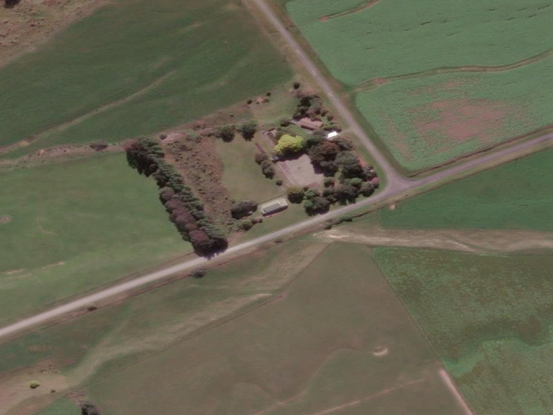 aerial view of Blue Cliffs Public Library (Hall) and the ground around it