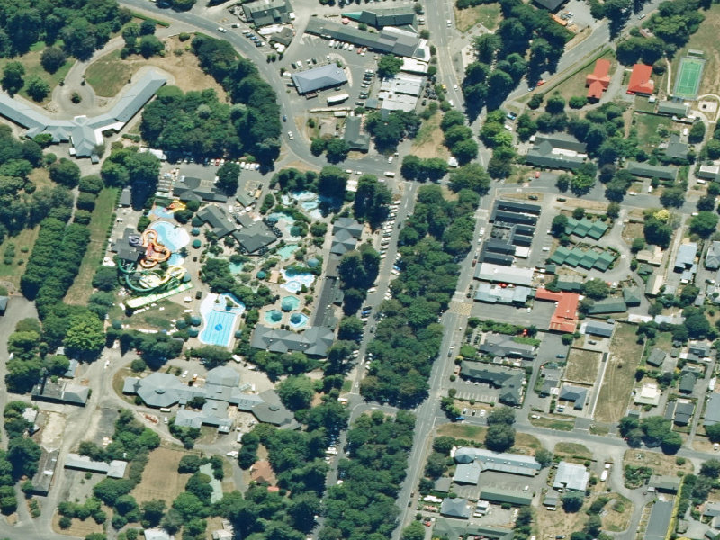 aerial view of Hanmer Springs I-Site Visitor Centre and the ground around it
