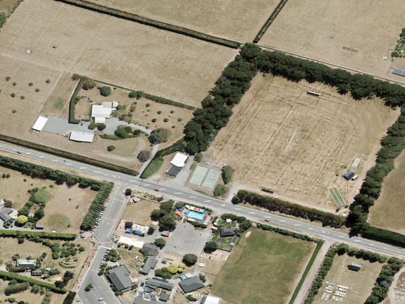 aerial view of Includes Pad and the ground around it