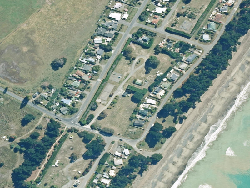 aerial view of Amberley Beach Reserve Public Toilets and the ground around it