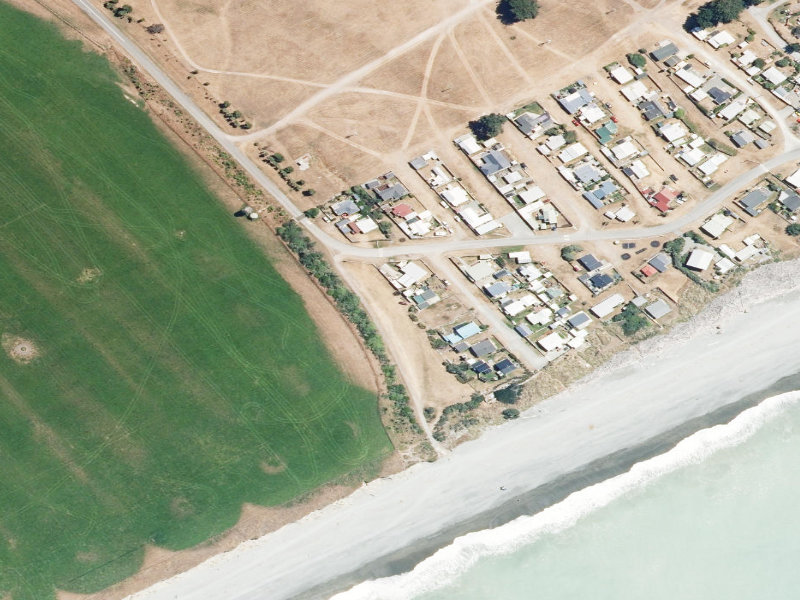 aerial view of Rangitata Reserve Toilets, Rangitata Huts, Rangitata Huts Road and the ground around it