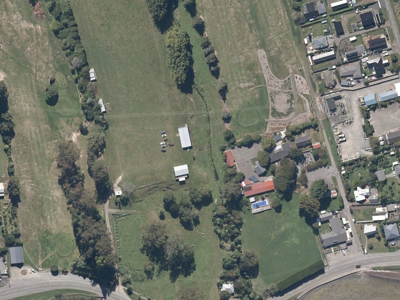 aerial view of Duvauchelle Showgrounds and the ground around it