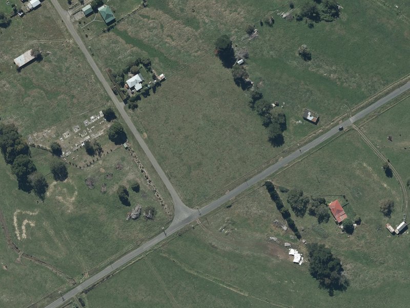 aerial view of Okains Bay Reserve and the ground around it
