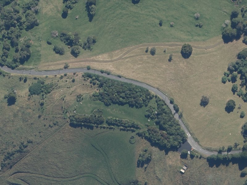 aerial view of Akaroa Heritage Park and the ground around it
