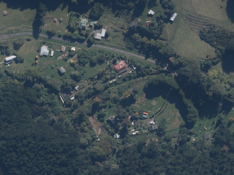 aerial view of Le Bons Bay Esplanade and the ground around it