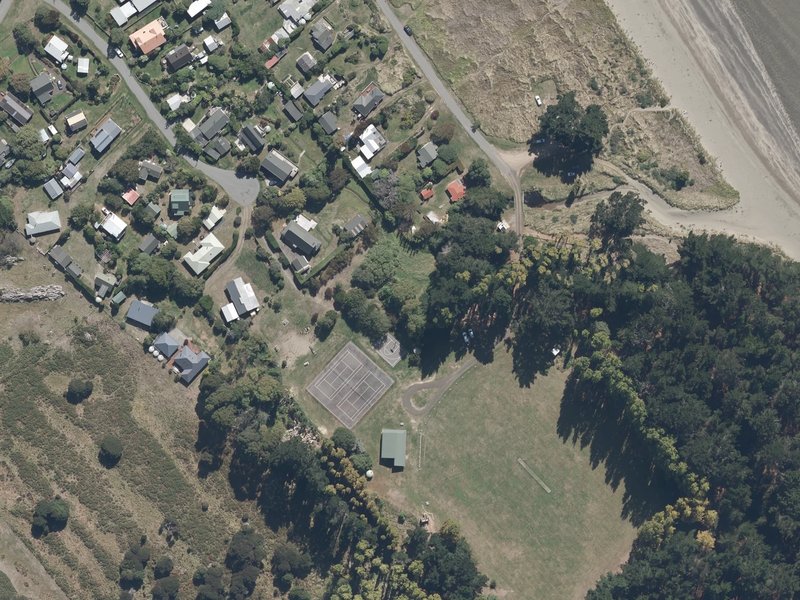 aerial view of Le Bons Bay Domain and the ground around it