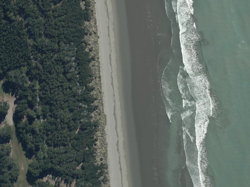 aerial view of Bottle Lake Beach Park and the ground around it