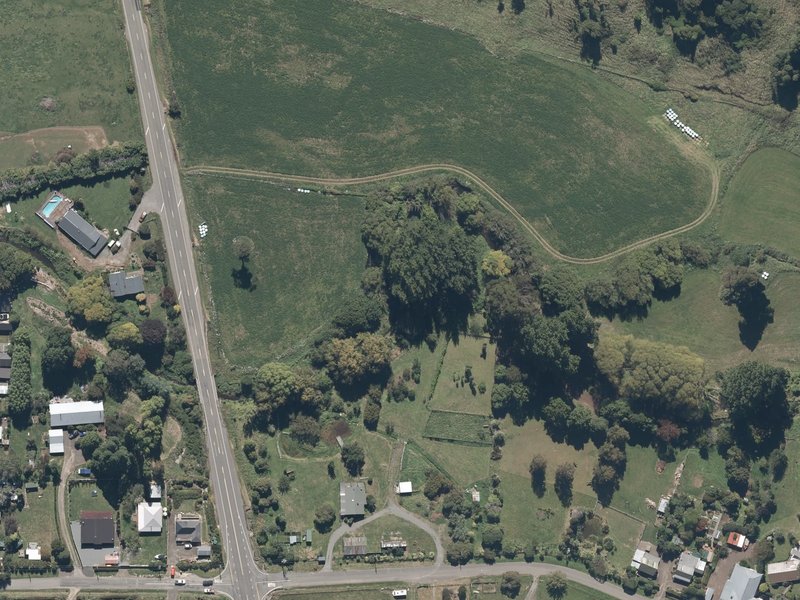 aerial view of Takamatua Stream Esplanade Reserve and the ground around it
