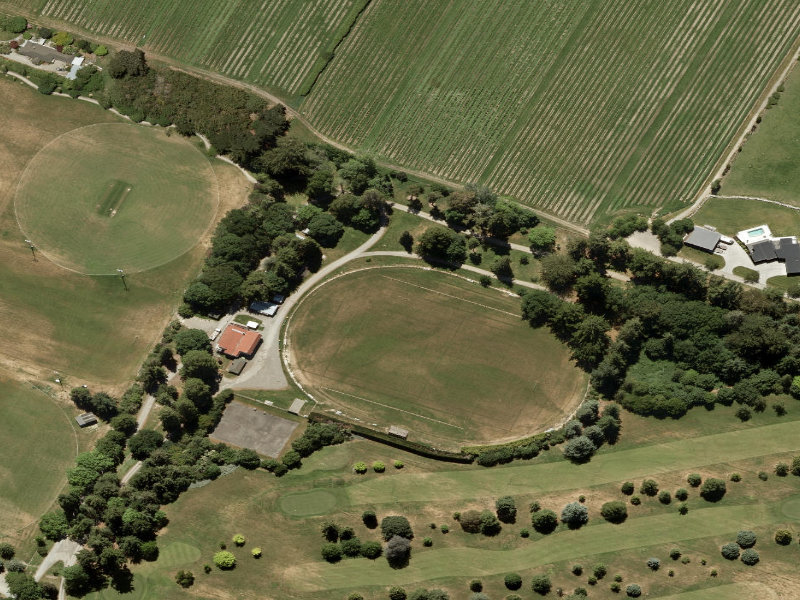 aerial view of Pleasant Point Motor Camp and the ground around it