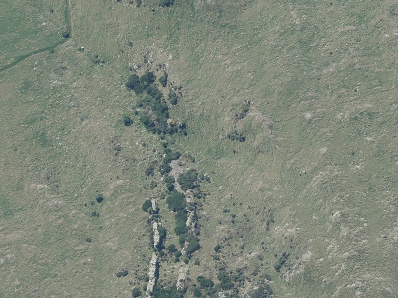 aerial view of Remarkable Dykes and the ground around it