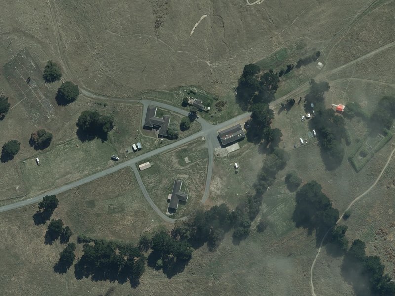 aerial view of Old Godley head lighthouse structure? and the ground around it