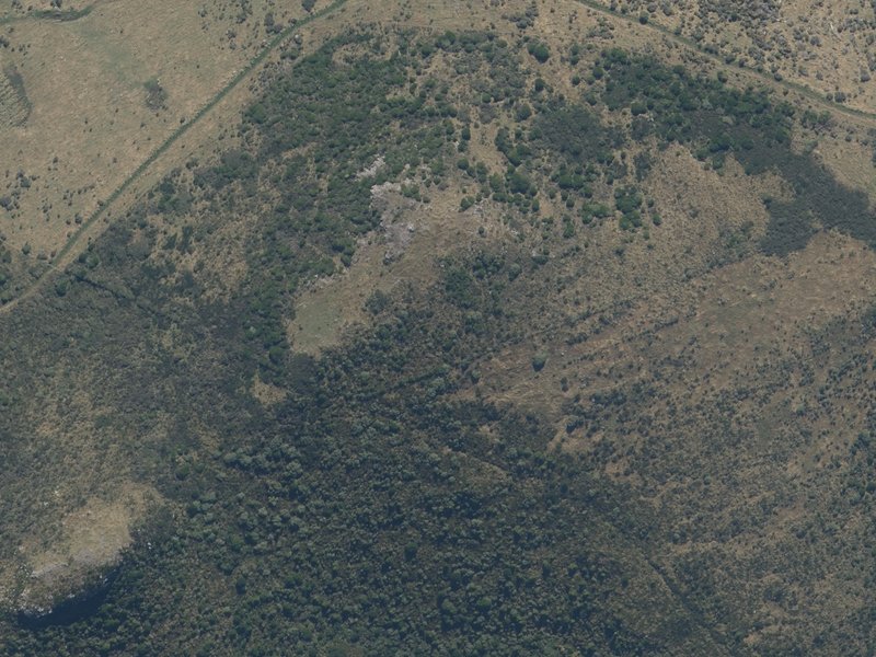 aerial view of Mount Sinclair and the ground around it
