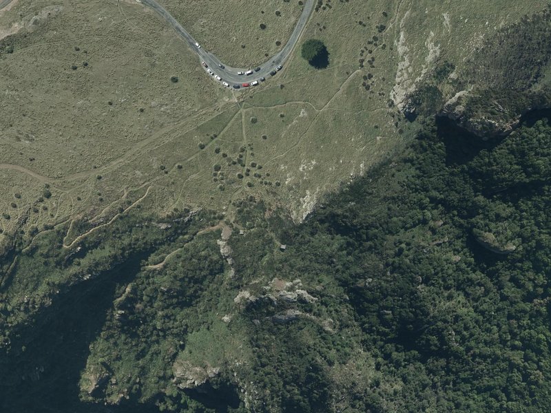 aerial view of Ōketeupoko / The Basket of Heads and the ground around it
