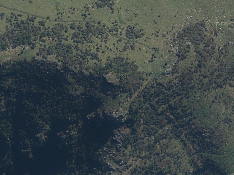 aerial view of West Peak and the ground around it