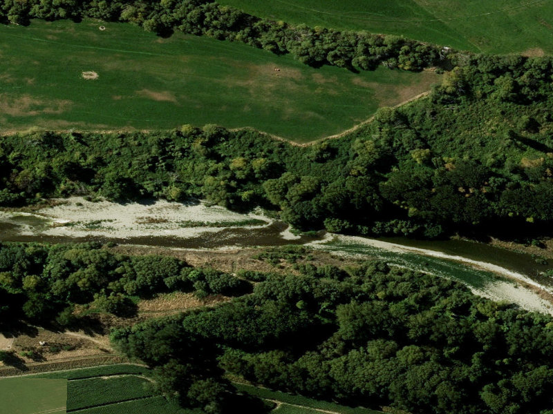 aerial view of Stratheona Huts To Te Ngawai Rd Across River and the ground around it