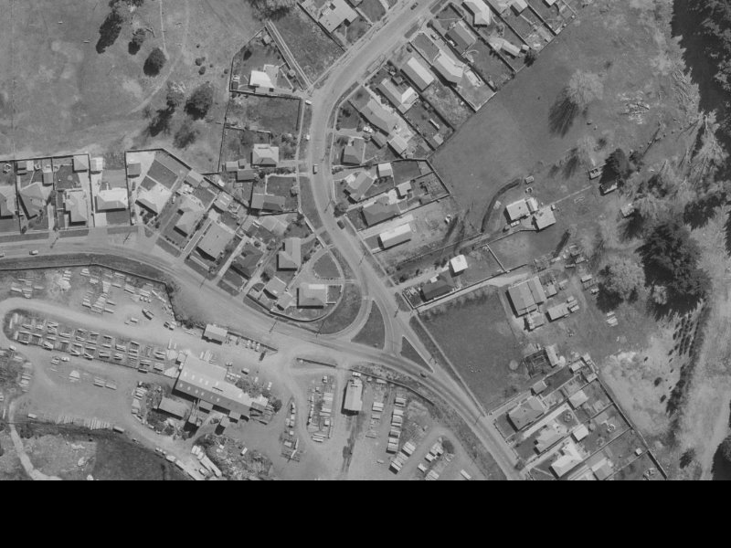 26–30 Waitikiri Drive from the air, 1970-1974