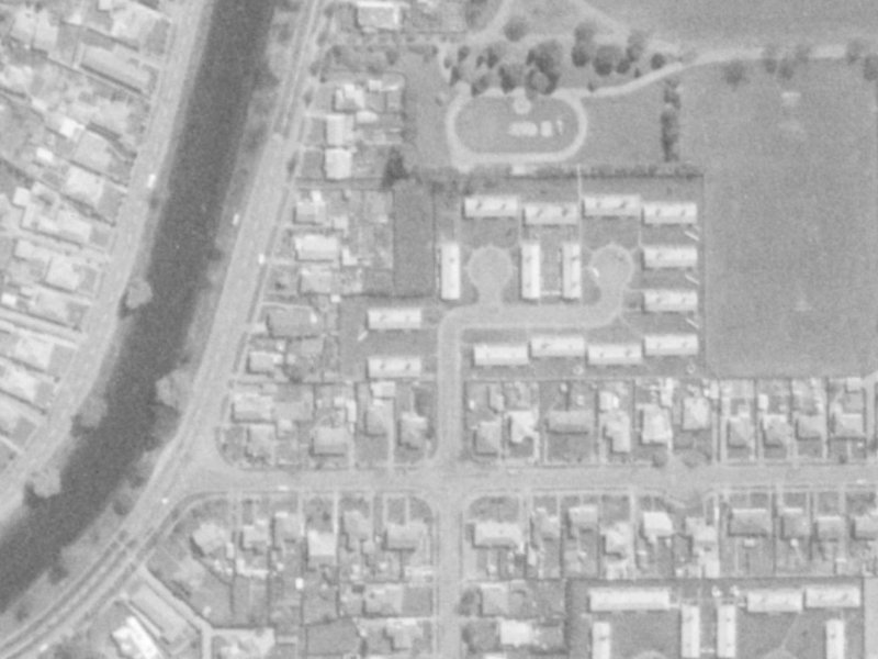 1-33 Mabel Howard Place from the air, 1975-1979