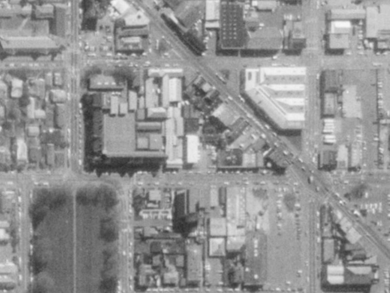 10/33 Kilmore Street from the air, 1975-1979