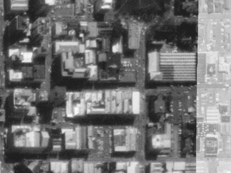 219-221 Cashel Street from the air, 1975-1979