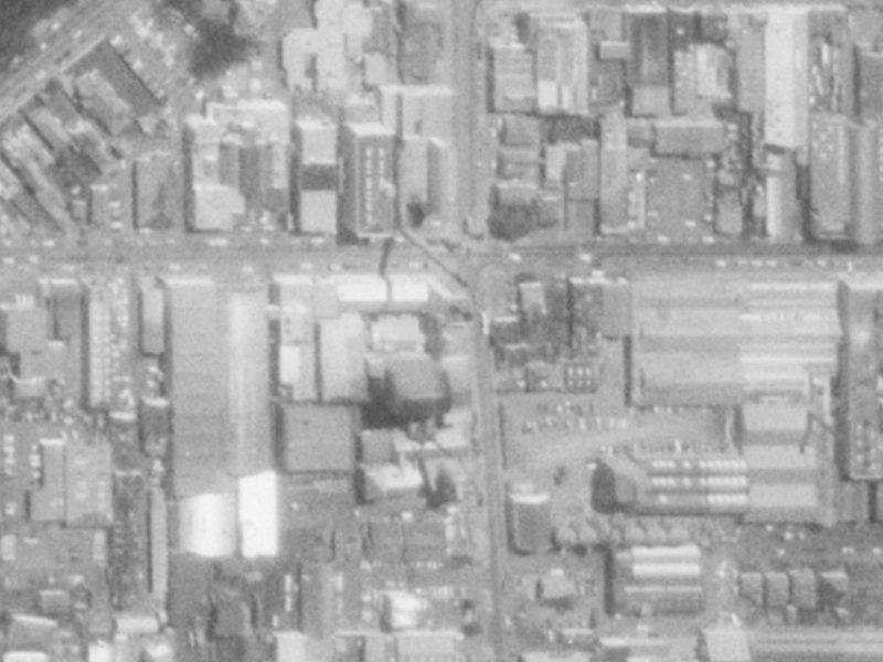 242–244 Antigua Street from the air, 1975-1979