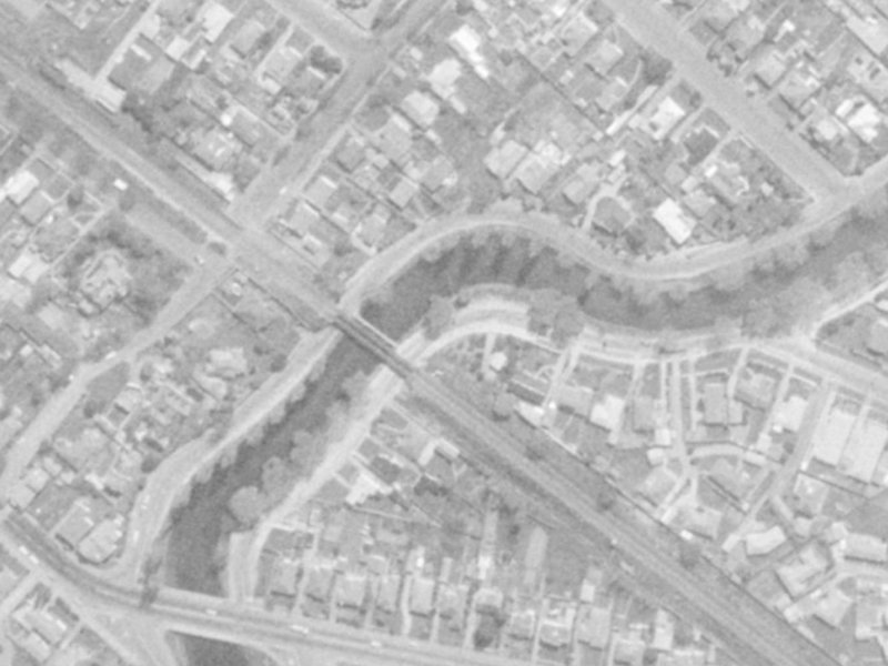 150 M Down River From Rail Way Bridge Broigham St Next To Pump Station On Clarendon Terrace from the air, 1975-1979