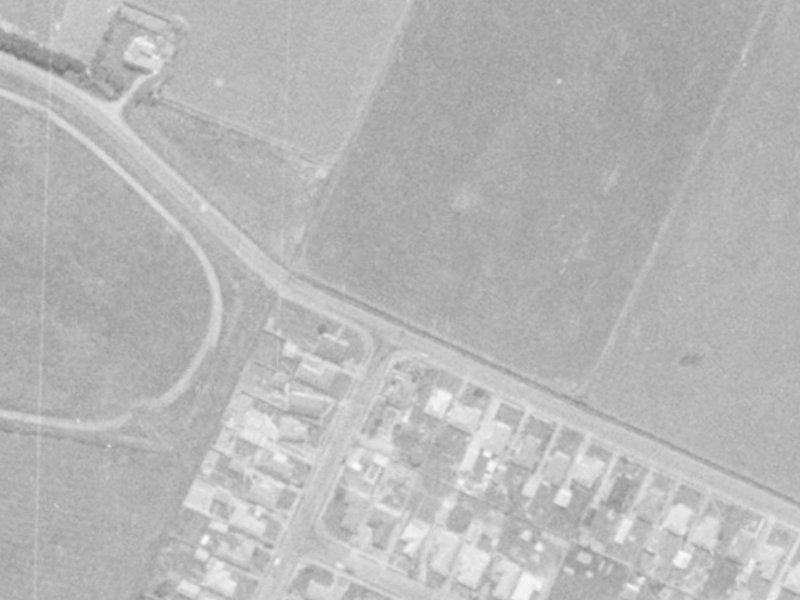 1–5 McMahon Drive from the air, 1975-1979