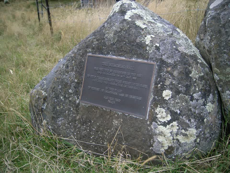 the register’s photograph of the plaque at Le Bons Bay Cemetery