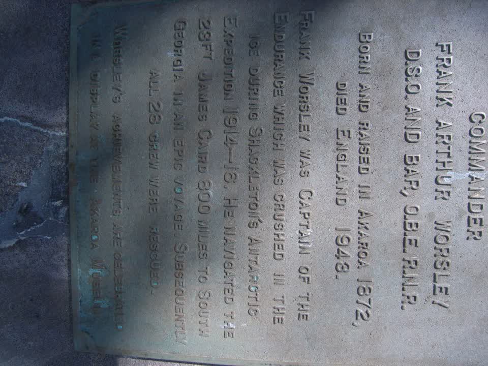 the register’s photograph of the plaque at Frank Worsley Bust
