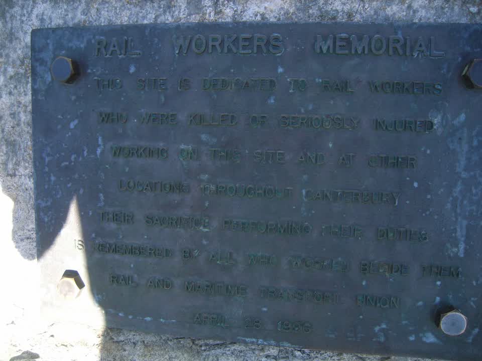 the register’s photograph of the plaque at Rail Workers Memorial