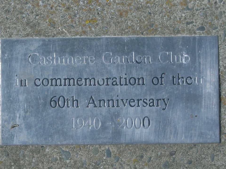 the register’s photograph of the plaque at Cashmere Village Green