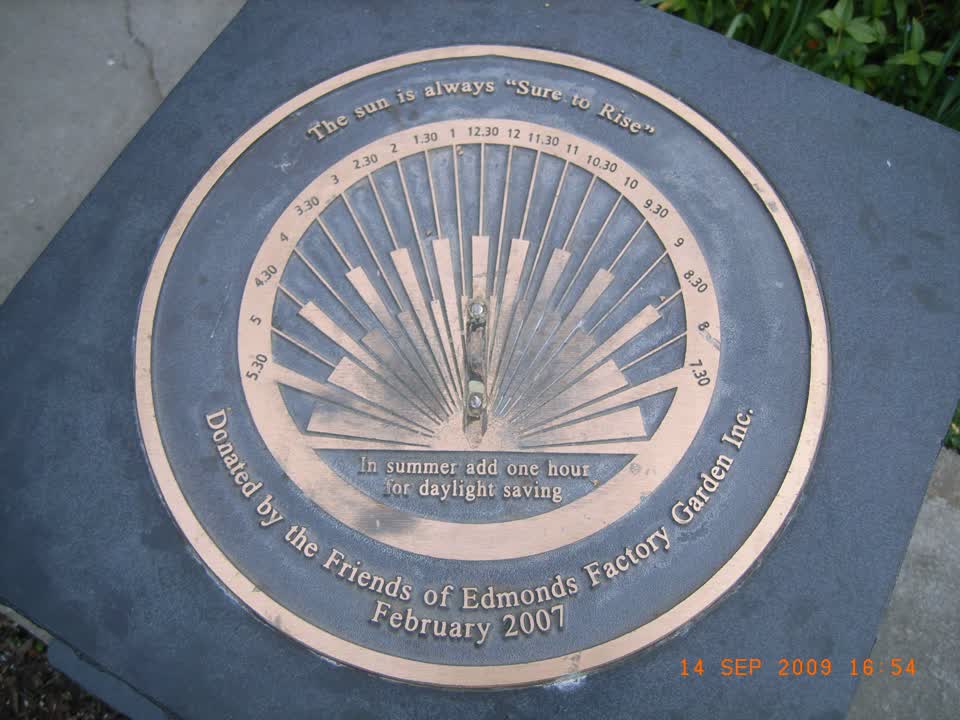 the register’s photograph of the plaque at Edmonds Factory Garden