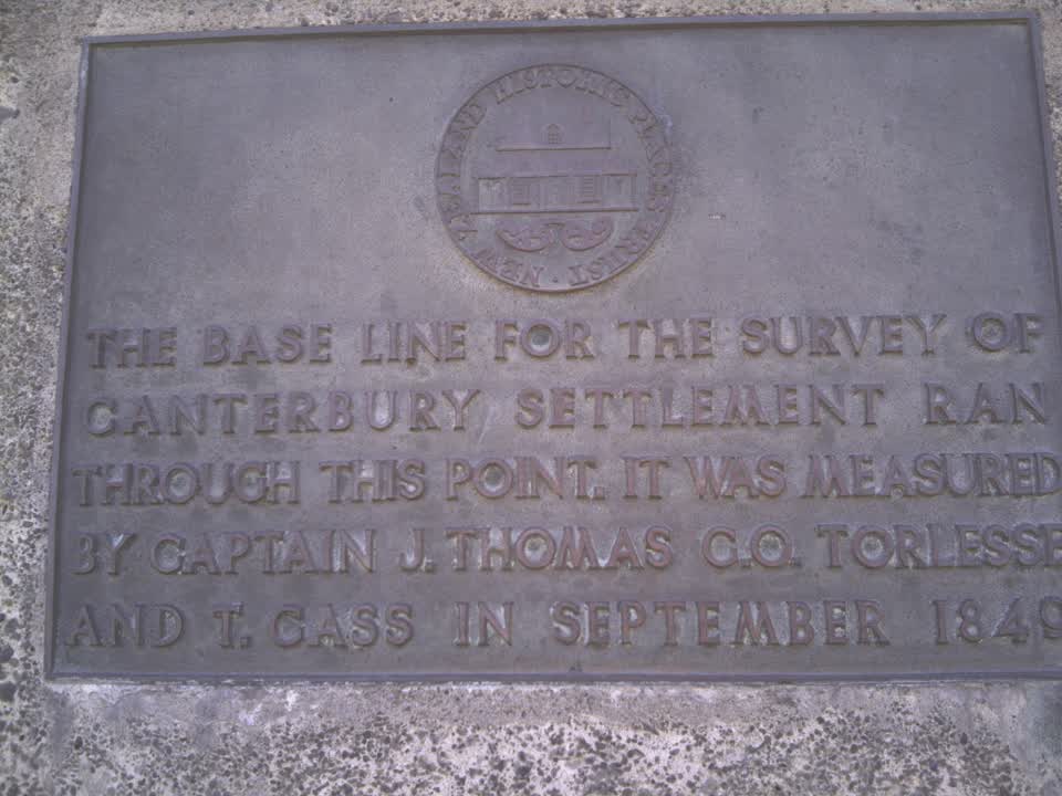 the register’s photograph of the plaque at Base Line Survey Monument