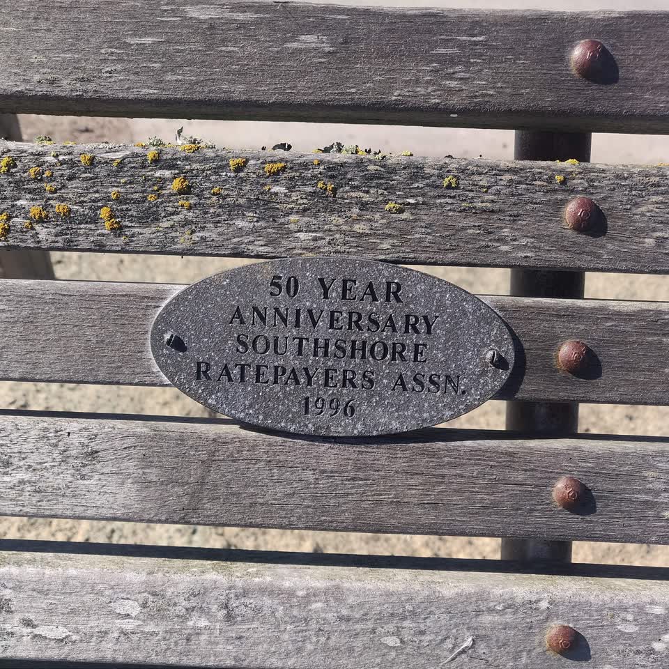 the register’s photograph of the plaque at Southshore Beach Park